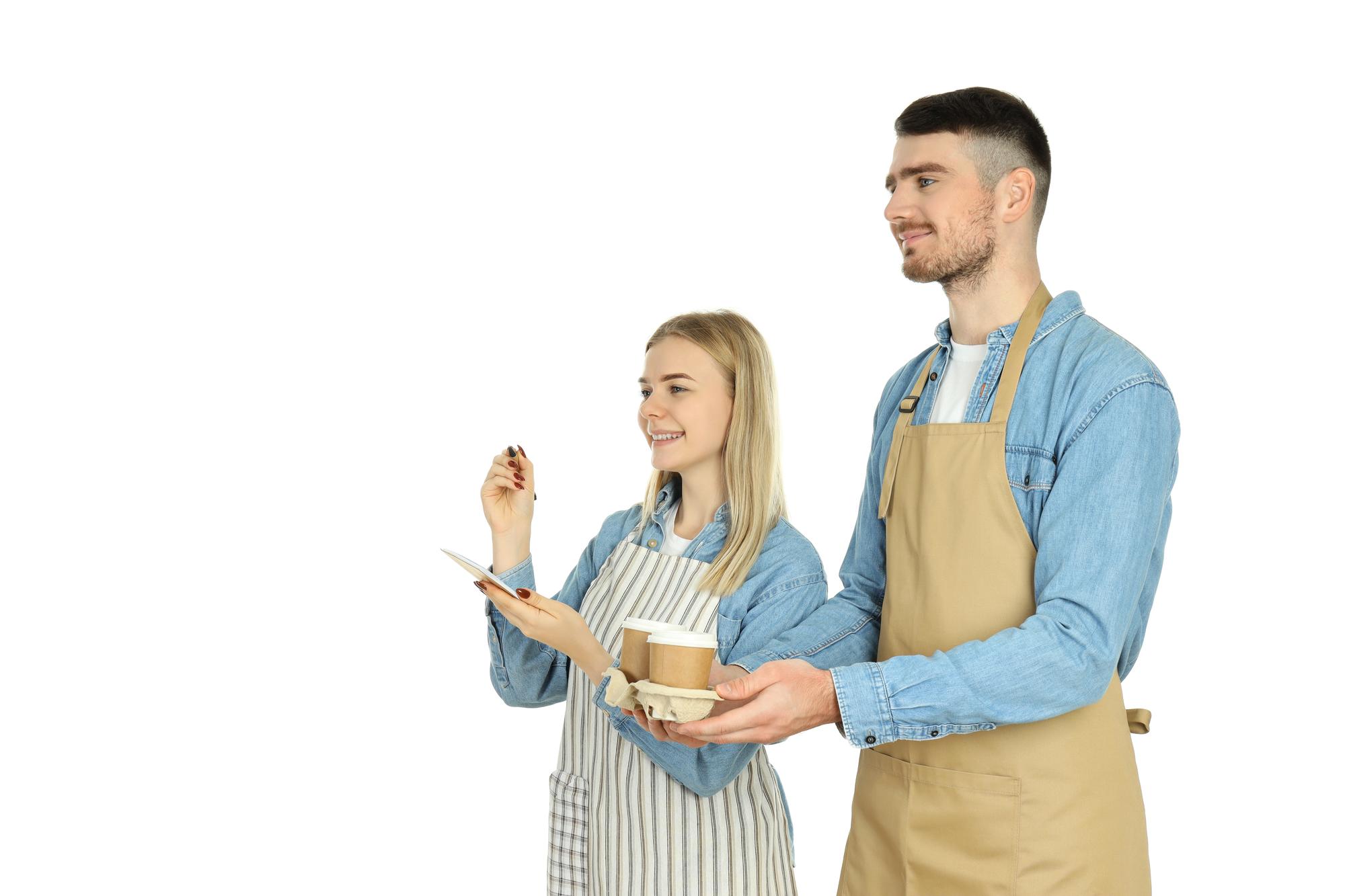 Consultant speaking with chef in kitchen