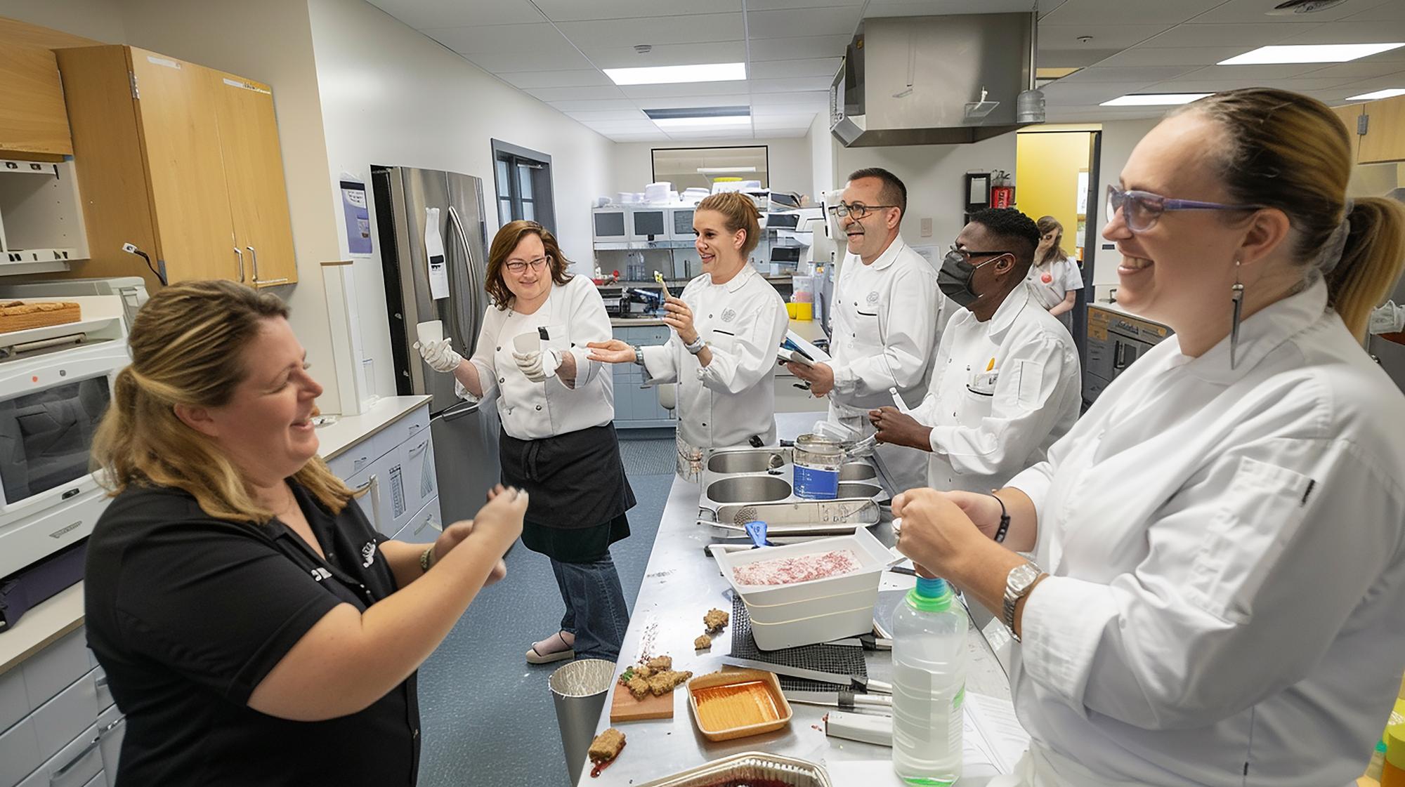 Chef demonstrating technique in class