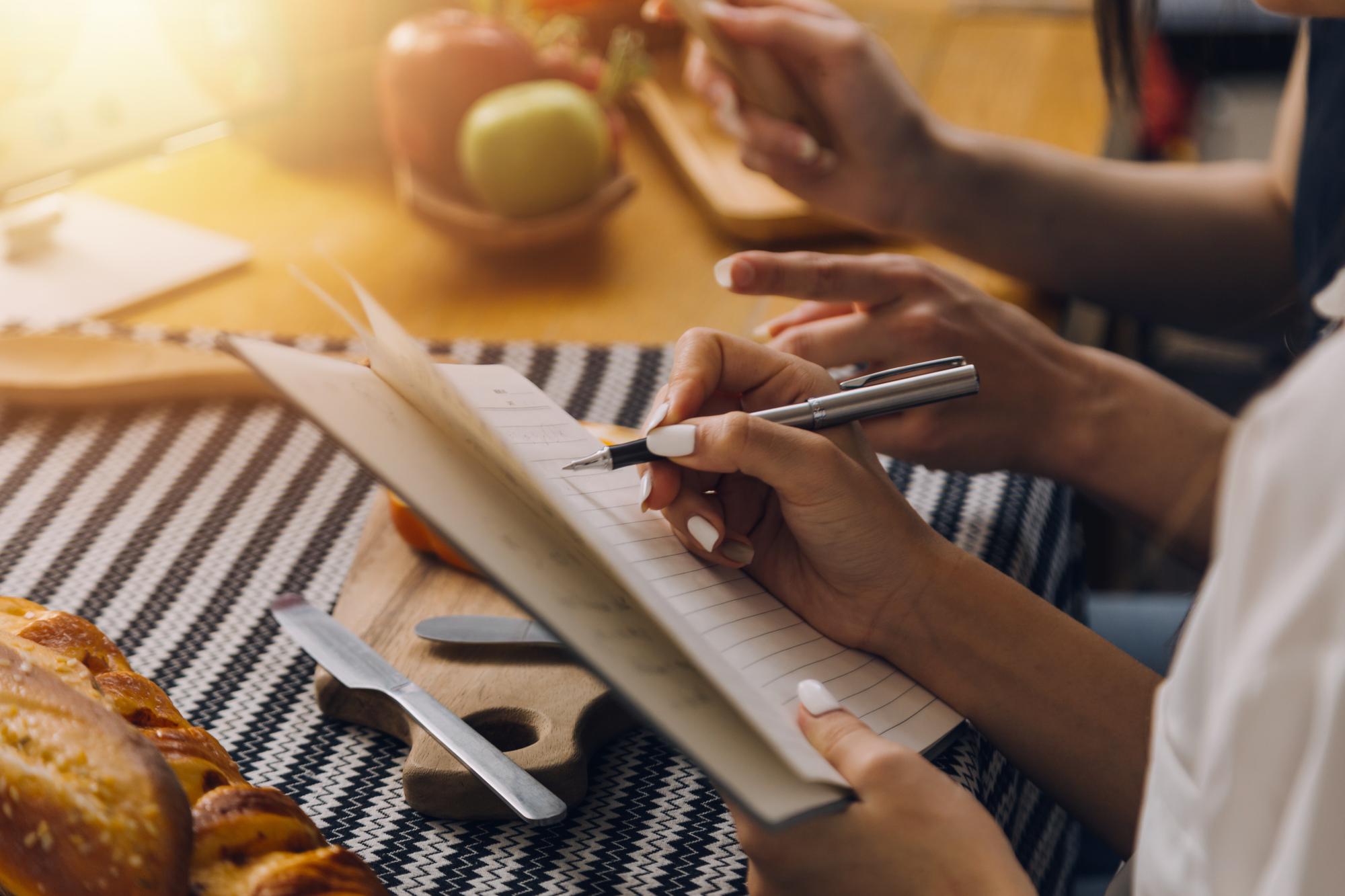 Notepad with menu planning sketches